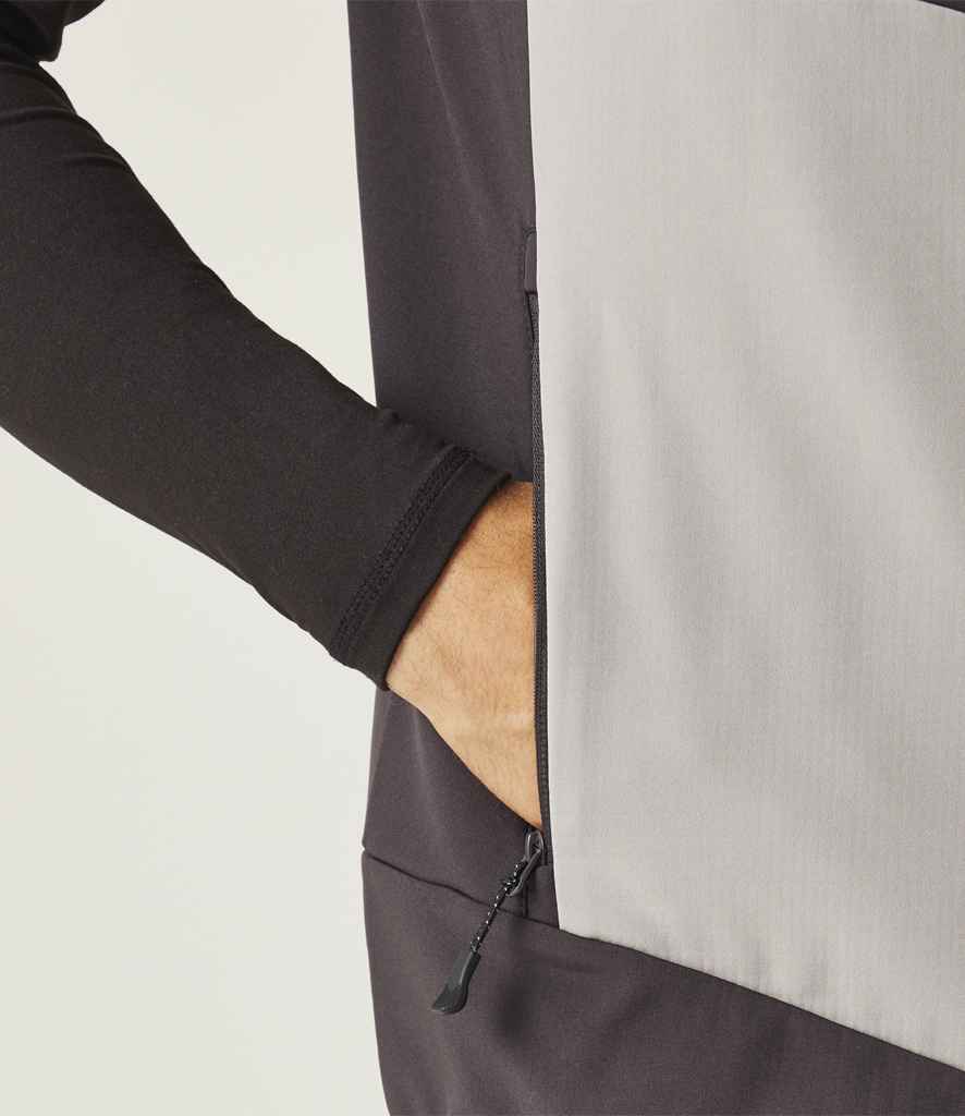 Close-up shot of model wearing the Regatta E-Volve Unisex Two Layer Soft Shell Bodywarmer in Mineral Grey / Black