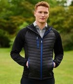 Model wearing the RG446 Regatta Navigate Hybrid Jacket in Black / New Royal Blue